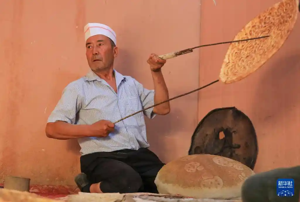天山七十载新篇 馕香古技焕异彩