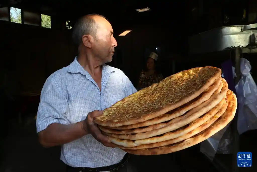 天山七十载新篇 馕香古技焕异彩